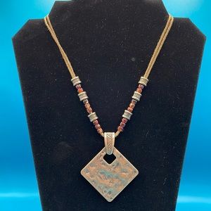 Bronze colored diamond shaped pendant N104
